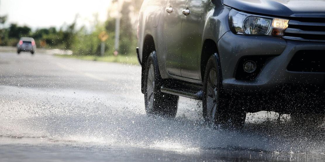 car driving through rain